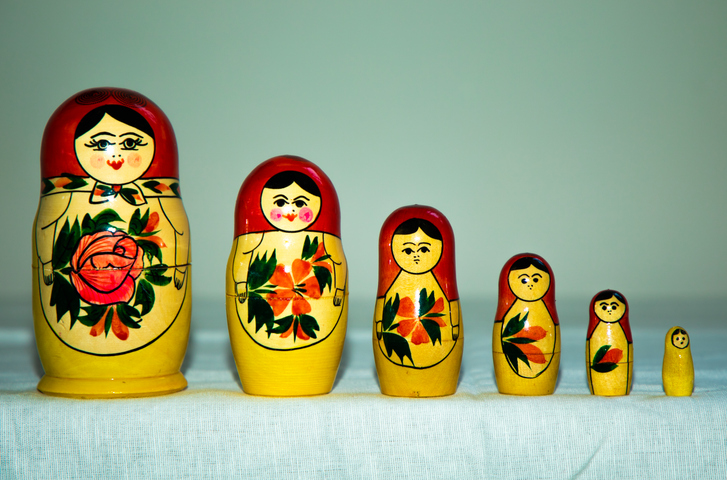 Babushka dolls in a white background